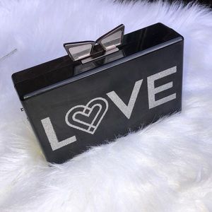 Lady Gaga and Elton John Plastic Love and Bravery Clutch